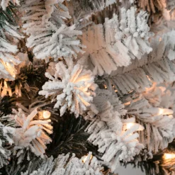 National Tree Company 9 ft. Pre-Lit Acacia Flocked Slim Tree with Clear Lights