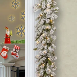 National Tree Company 9 ft. Pre-Lit Snowy Sheffield Spruce Garland with Clear Lights
