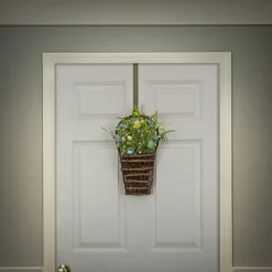National Tree Company 18 in. Easter Hanging Wall Basket Decorated with Pastel Eggs and Spring Flowers
