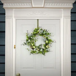National Tree Company 22 in. Easter Wreath Decorated with Pastel Eggs, Blue Flowers