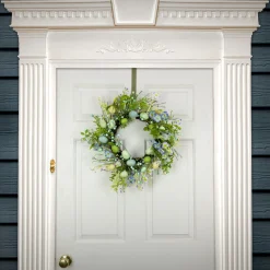 National Tree Company 20 in. Easter Wreath Decorated with Blue Flower Blooms, Pastel Eggs