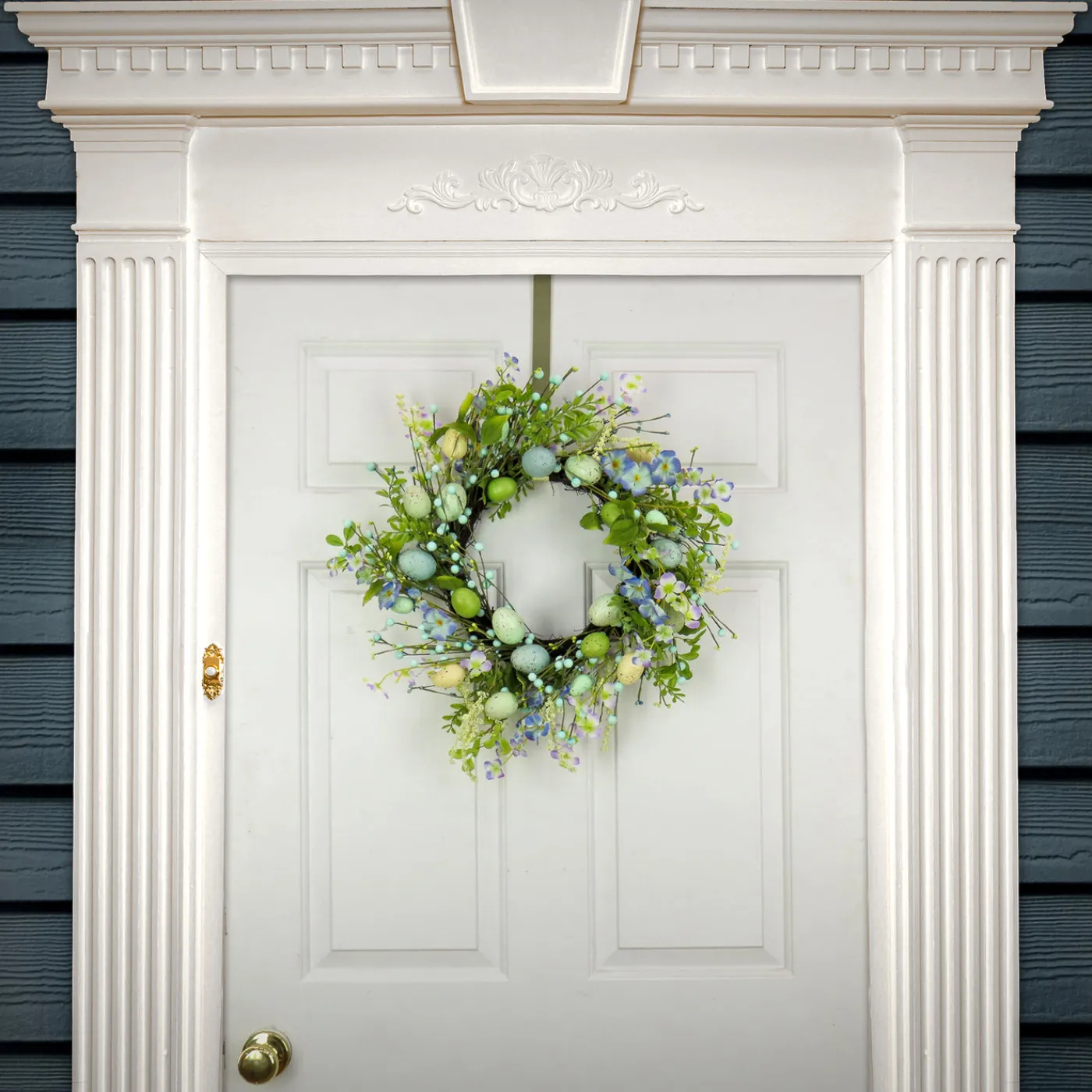 National Tree Company 20 in. Easter Wreath Decorated with Blue Flower Blooms, Pastel Eggs