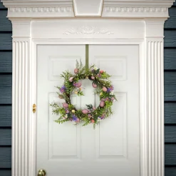 National Tree Company 22 in. Easter Wreath Decorated with Pink Pastel Eggs, Purple Flowers, Ferns, Leafy Greens