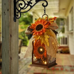 National Tree Company 12 in. Fall Lantern with LED Lights, Filled with Sunflower Blooms, Leaves, Pinecones, Berry Clusters