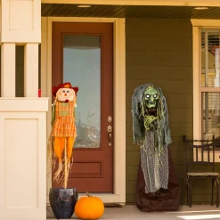 National Tree Company 59 in. Halloween Pre-Lit Sound Activated Animated Scary Green Witch with LED Lights