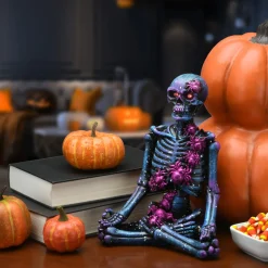 National Tree Company 10 in. Halloween Purple Galaxy Meditating Skeleton with LED Lights