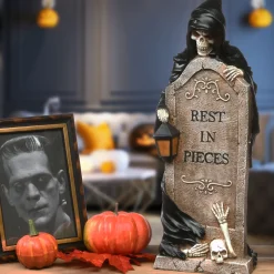 National Tree Company 16 in. Halloween Skeleton Grim Reaper Standing with a Gravestone Decoration
