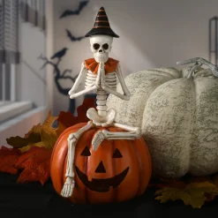 National Tree Company 12 in. Halloween Trick or Treat Skeleton on Jack O Lantern with LED Lights