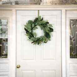 National Tree Company 22 in. Spring Wreath with Eucalyptus Leaves, Magnolia Blooms, Flowing Green Stems